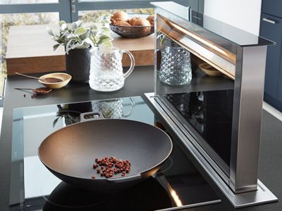 Geïntegreerde afzuigkap in kookplaat - Küchen Design Kleve